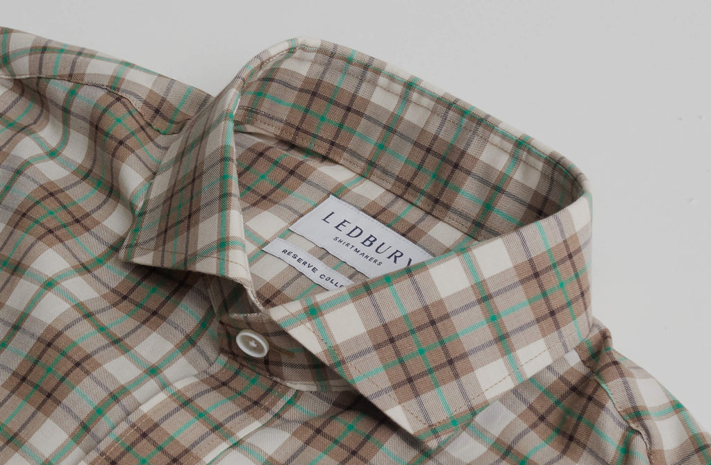 Closeup of the collar of a mens green and brown plaid dress shirt from Ledbury